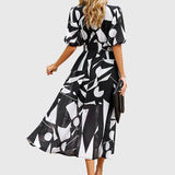 Merlin - Felszabadító Virágos Midi Ruha