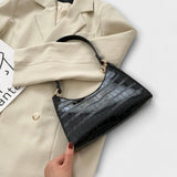 Olivia - Fényes bőr kézitáska