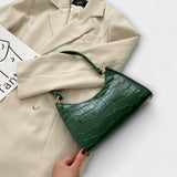 Olivia - Fényes bőr kézitáska